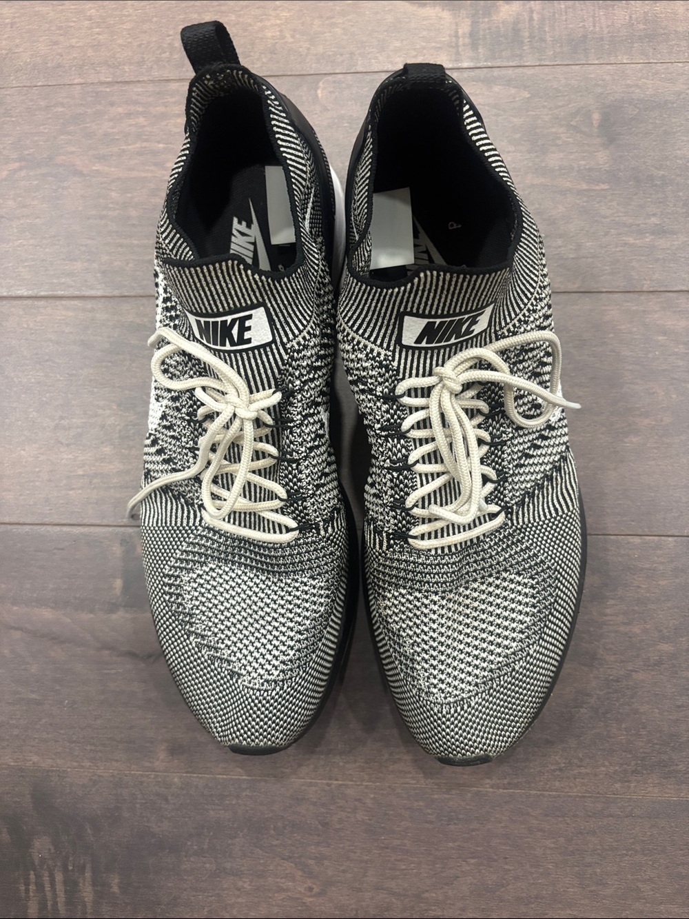 Nike Black & White Flyknit Athletic Sneakers Slip on sneakers Men’s